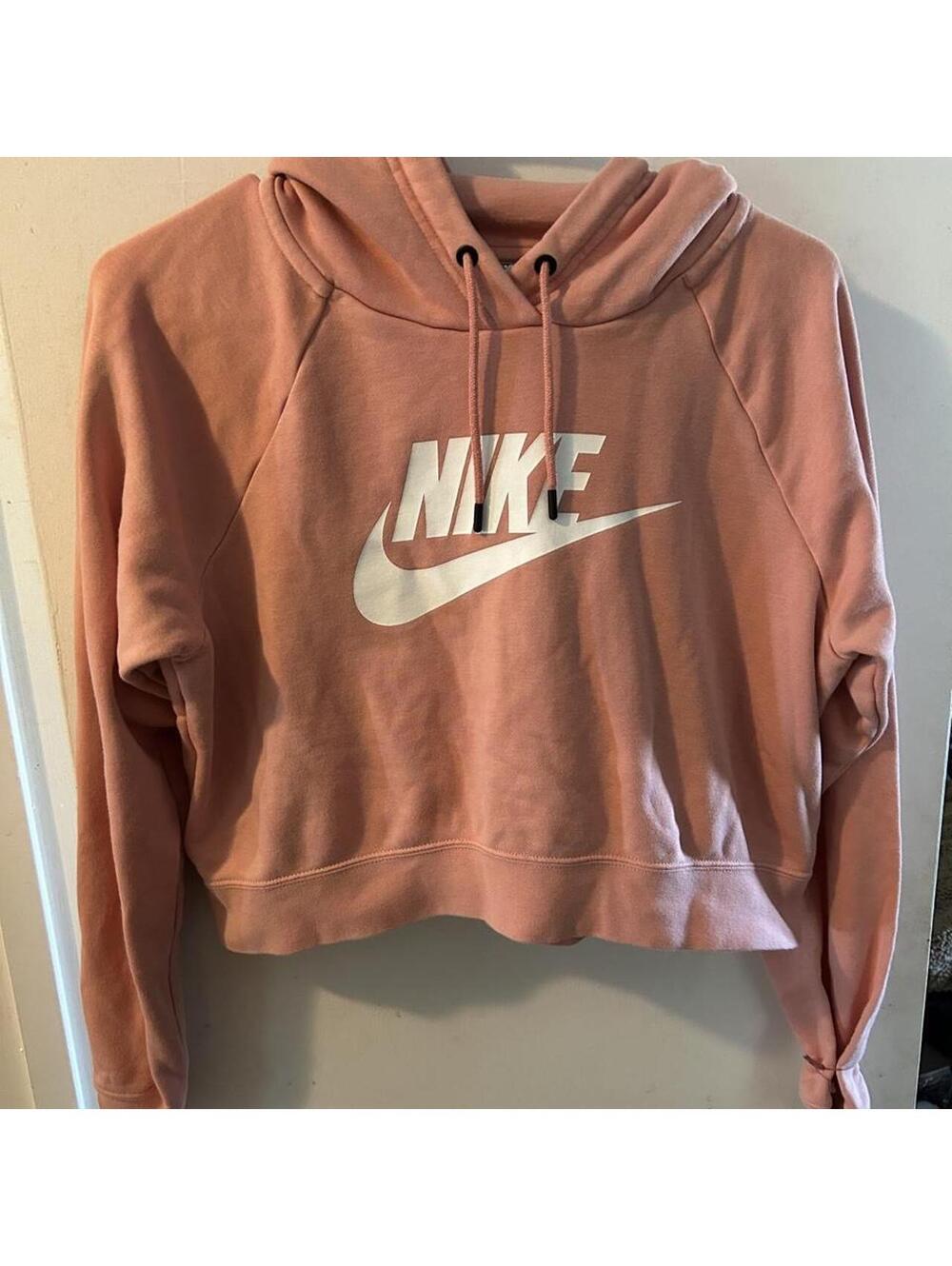 Pink Nike cropped athletic hoodie in size M
